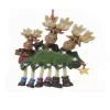Family Of 3 Moose With A Tree
